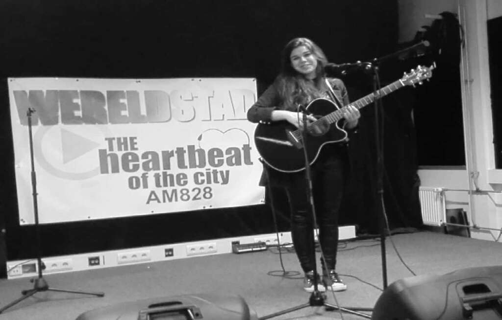 Delise op podium bij Wereldstad Studio